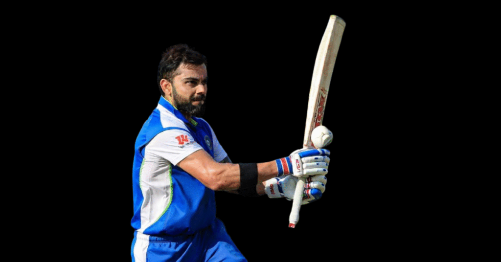 "Colored image of Indian male cricketer in blue uniform holding bat on cricket field"